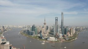Aerial 4k video of Shanghai in the morning sunrise and view of Lujiazui, The bund with dolly shot camera movement