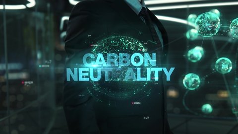 Businessman with Carbon Neutrality hologram concept