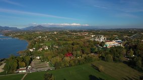 Aerial video with drone. Amusement park Gardaland, Italy.  Resort place. Aerial view. Autumn-winter season