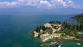 Beautiful coastline in the park Belvedere Romano, Baia delle Sirene, Lake Garda, Italy. Aerial video with drone
