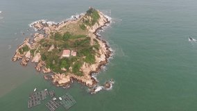 Binh Thuan, Vietnam Nov 08/2019 aerial view 4k video of Ke ga Lighthouse from above during late afternoon
