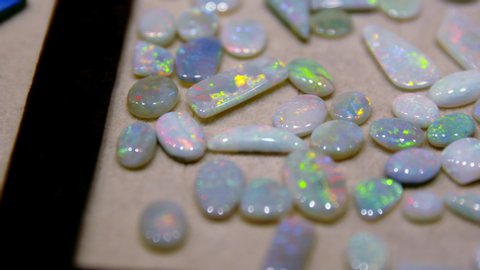 Polished opal stones, cut out from the mines in Coober Pedy, Australia.