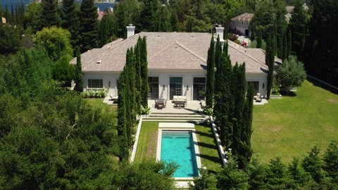 Mansion in Westlake village by lake Sherwood, aerial shot of real estate exterior, house holding in California: Los Angeles, California / United States - 11 29 2019