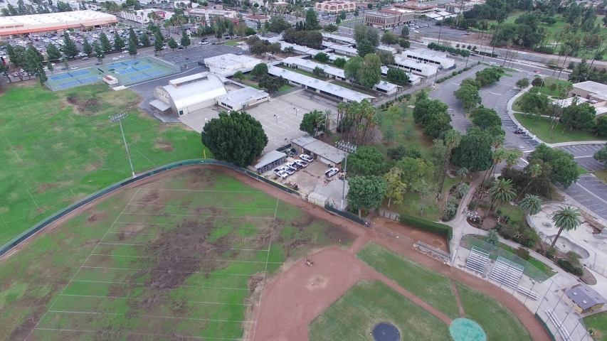 Anaheim California Urban Residential Neighborhood Cloudy Day Playground Aerial View.MOV