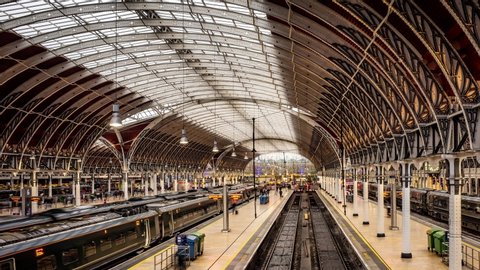LONDON- DECEMBER, 2019: Time lapse of trains arriving and departing from Paddington Station, a major London railway terminus
