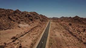 4K aerial drone video of gravel plains and granite rock formations near town Karasburg, B1 highway in the south of Namibia and dry waterless hot bush savanna in Grunau District, southern Africa