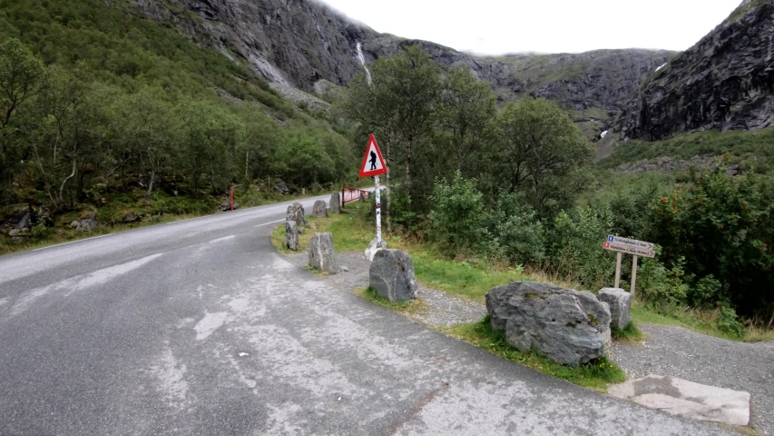 A traffic sign warning about Troll crossing at Trollstigen Road in Norway