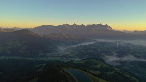 Kitzbuehel Austria Summer Morning - Sunrise view from Hahnenkamm to Wilder Kaiser Mountain Range