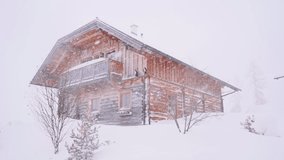 Heavy snowfall in a wintry mountain alpine village, wooden house
 - Powered by Shutterstock - Get 15% off with code: PIKWIZARD15