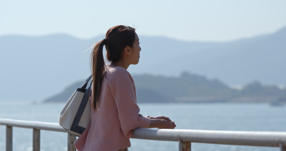 Woman looks at the sea