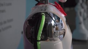 Artificial Intelligence. The robot shows emotions. Modern robotics. The machine looks and smiles at people. Eyes of the robot. Cyborg. Futuristic robot concept. artificial intelligence virtual robot - Powered by Shutterstock - Get 15% off with code: PIKWIZARD15