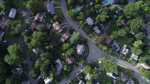 Iconic 4K aerial of a typical American suburbs neighborhood in summer