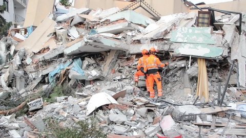 Durres, Albania 27 Nov 2019: Rescuers and Dogs searching for missing people after deadly earthquake. Rescue action after earthquake in Durres. Powerful earthquake hit Albania. Natural disaster. 