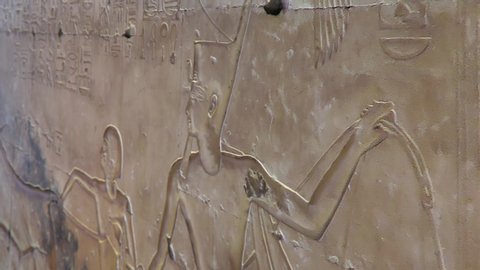CGI of ancient Egyptian carvings of Prince Amun-her-khepeshef at the Temple of Abydos Egypt,close up shot, shallow depth of field.