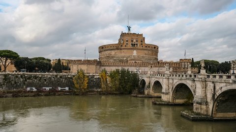 Rome, italy - december 14 2019: Rome,Santangelo castle bridge zoom in view,people tourists,river water flow,timelapse 4k 