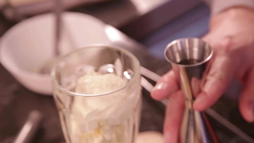 Pour Viscous Liquid Over Ice Cream - Close Up