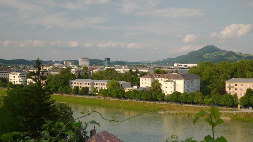 sunset time salzburg city riverside landscape hilltop slow motion panorama 4k austria