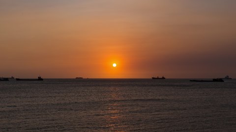 The sunset on the sea at Vung Tau. Time lapse 4k video.