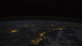 Planet Earth view seen from the International Space Station with city lights over West Africa, Time Lapse 4K. Images courtesy of NASA Johnson Space Center. Prores 4K