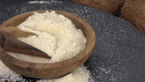 Coconut flour on a rotating plate as seamless loopable 4K clip