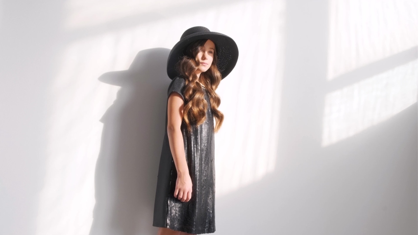 cute girl in a black hat
