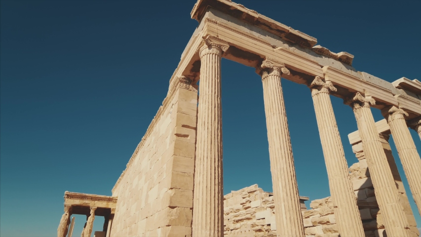Ancient greek temple ruins of Erechtheion at the Acropolis in Athens, Greece Royalty-Free Stock Footage #1043335021