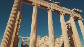 Ancient greek temple ruins of Erechtheion at the Acropolis in Athens, Greece - Powered by Shutterstock - Get 15% off with code: PIKWIZARD15