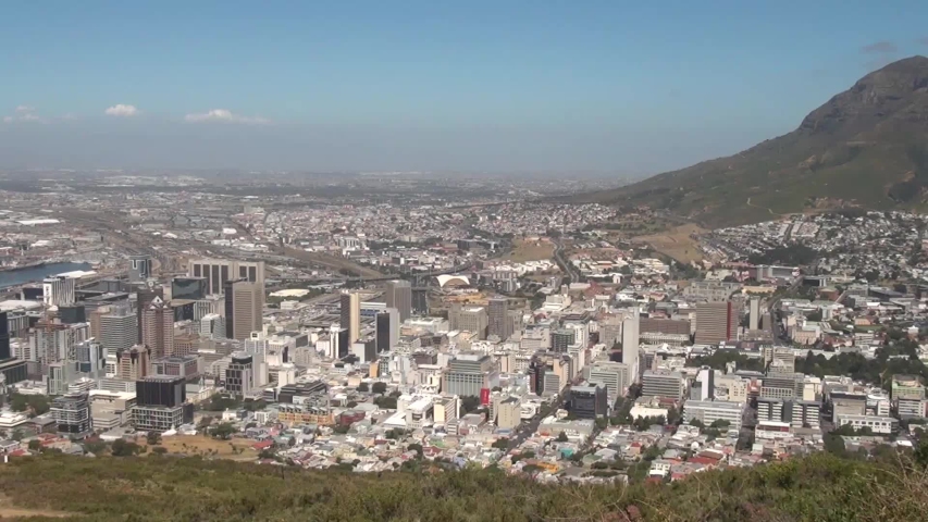 HD high quality sunny day video of spectacular scenic Table Mountain, wide Cape Town city center panorama, Atlantic Ocean bay from Signal Hill view point in Western Cape, Cape Town, South Africa