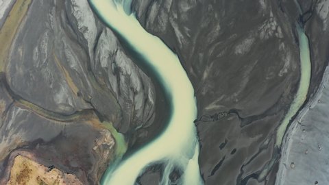 Aerial view of patterns of Icelandic rivers flowing into the ocean. Iceland in early spring