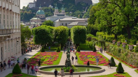 SALZBURG, AUSTRIA - JULY 7 2019: cityscape sunny day famous garden fountain panorama 4k timelapse circa july 7 2019 salzburg, austria.