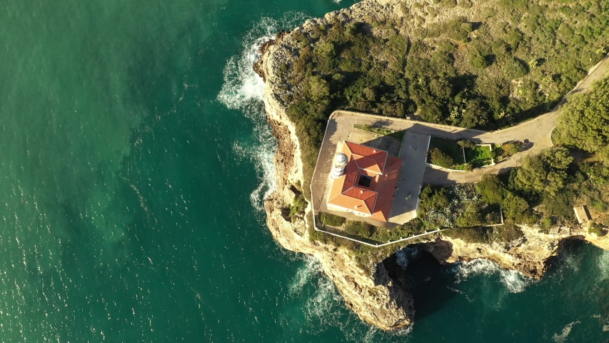 lighthouse in the Bay of Portocolom Mallorca Spain