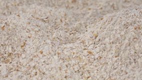 Portion of rotating Oat Flour (seamless loopable; 4K)