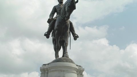 Aerial flying over equestrian statue of Civil War General Robert E. Lee. Richmond, Virginia, USA. 18 August 2019 