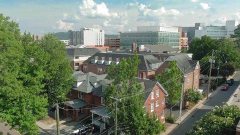 Aerial: establishing shot of the the city of Charlottesville, Virginia, USA 