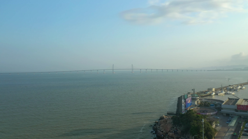 MACAU, ZHUHAI, HONG KONG, CHINA - FEBRUARY 8 2019: hong kong bridge sunny day zhuhai bay aerial panorama 4k circa february 8 2019 macau, zhuhai, hong kong, china.