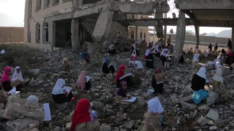 Taiz  Yemen - 27 Dec 2018 : Children study inside a school destroyed by war in Yemen, Taiz