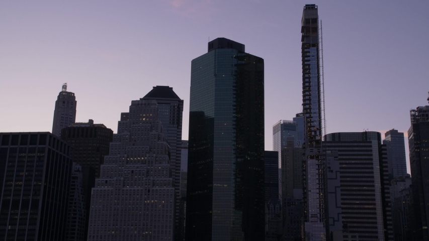 manhattan skyline handheld slow motion shot from boat at the end of the day