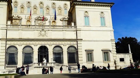 Rome, February 27, 2019: Tourists in front of the Palazzo della Galleria Borghese, from 1902 it was transformed into a museum with works by Canova, Caravaggio and Raffaello