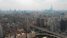 Aerial 4k video of Shanghai in the morning day time sunrise and view of Lujiazui, The bund with dolly shot camera movement - Powered by Shutterstock - Get 15% off with code: PIKWIZARD15