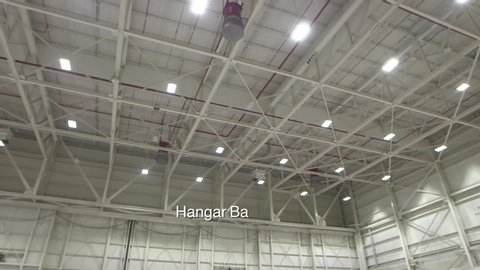 CIRCA 2016 - High Expansion foam is pumped into a NASA hangar from the ceiling.