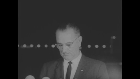 CIRCA 1963 - After JFK's assassination, LBJ gives a speech about his sorrow at the Washington DC airport.