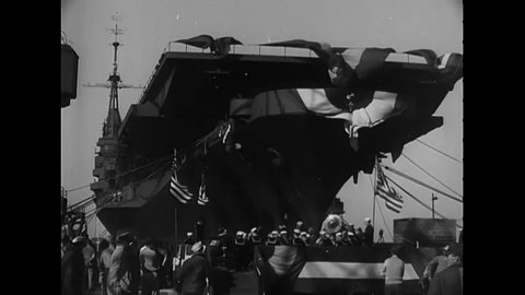 CIRCA 1945 - Close-ups show members of the USS Midway's sponsor party before it is christened.
