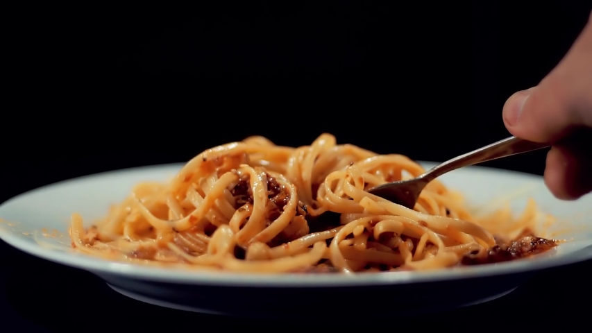 Eat Pasta Italian And Sauce Bolognese. Spaghetti,Tomato And Parmesan. Italian Carbonara Cuisine In Restaurant Eating Pasta Bolognese. Chef Tasting Spaghetti Marinara Sauce.Delicious Italian Pasta Food Royalty-Free Stock Footage #1043563318