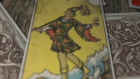Budapest, Hungary - May 14, 2019: Tarot Card THE FOOL or the Jester, Close Up, Mystery of Protagonist of a Story, Everyman, Fool's Journey