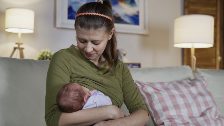 Woman Mother Feeds Newborn Baby Breast