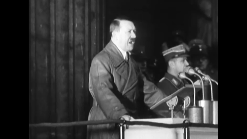 CIRCA 1939 - Hitler addresses a large outdoor crowd, explaining how he has made Germany great.