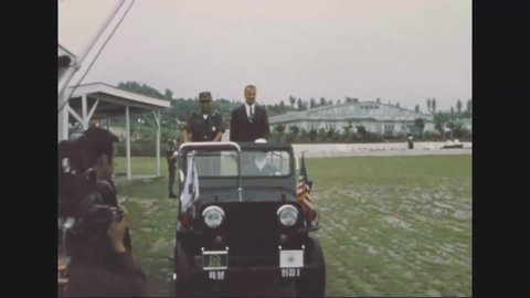 CIRCA 1970 - Vice President Agnew and General Sung view Korean troops from a jeep.