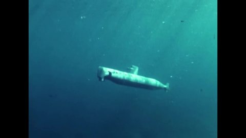 CIRCA 1968 - The USS Seawolf atomic submarine is seen underway underwater.