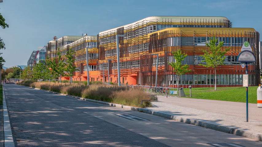 Modern buildings with library and Learning Center Of Vienna University of Economics and Business timelapse (Wirtschaftsuniversitat Wien) is the largest Business University in Europe. Blue sky at sunny