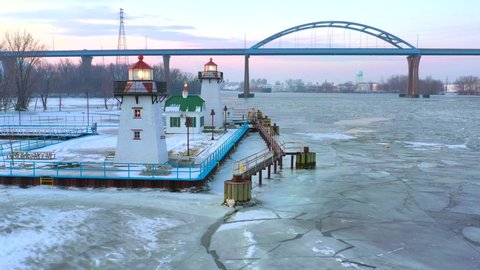 Scenic drone view of two beautiful lighthouses, early on a Winter morning.
